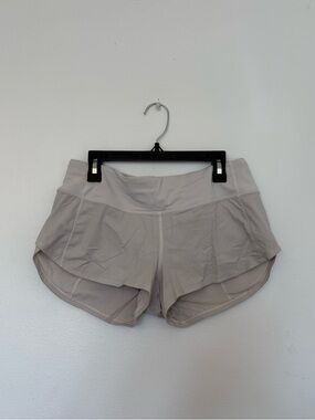 Lululemon white speed up shorts. Size 4.